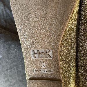 H2K gold sparkly flats….